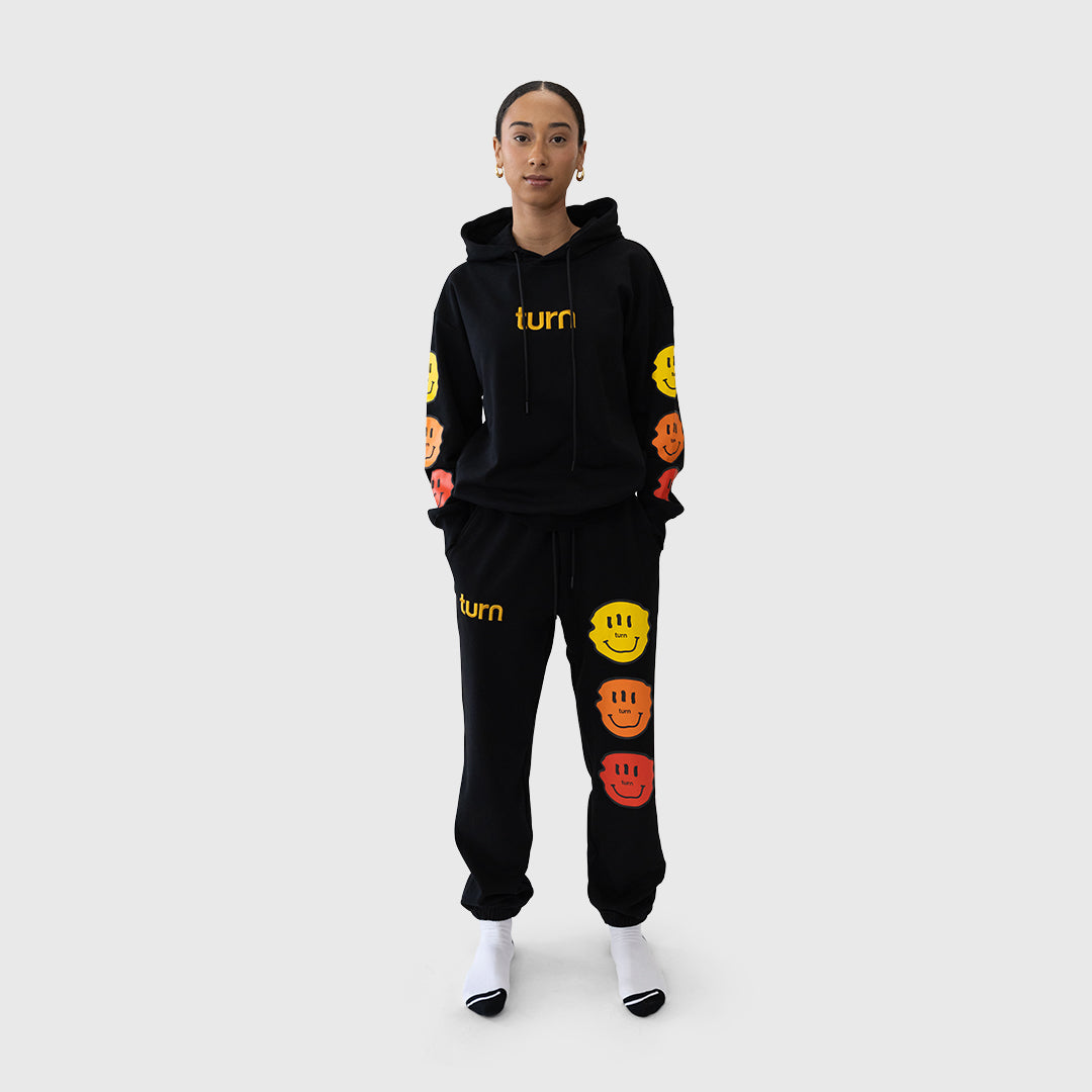 triple orange smiley joggers